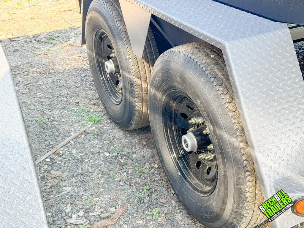 Dual axles on the 14ft Bwise DLP 15.4k HD Dump Trailer.