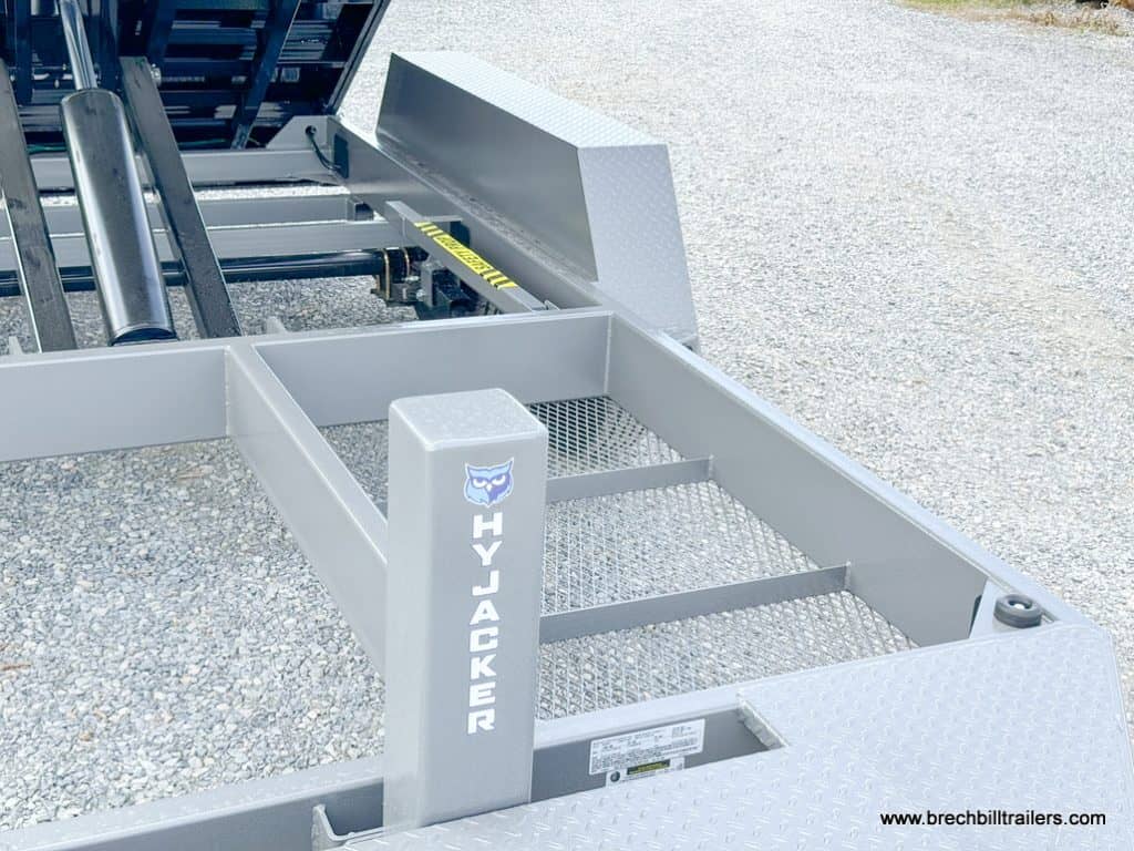 View of the gray frame while the trailer is in the dump position.