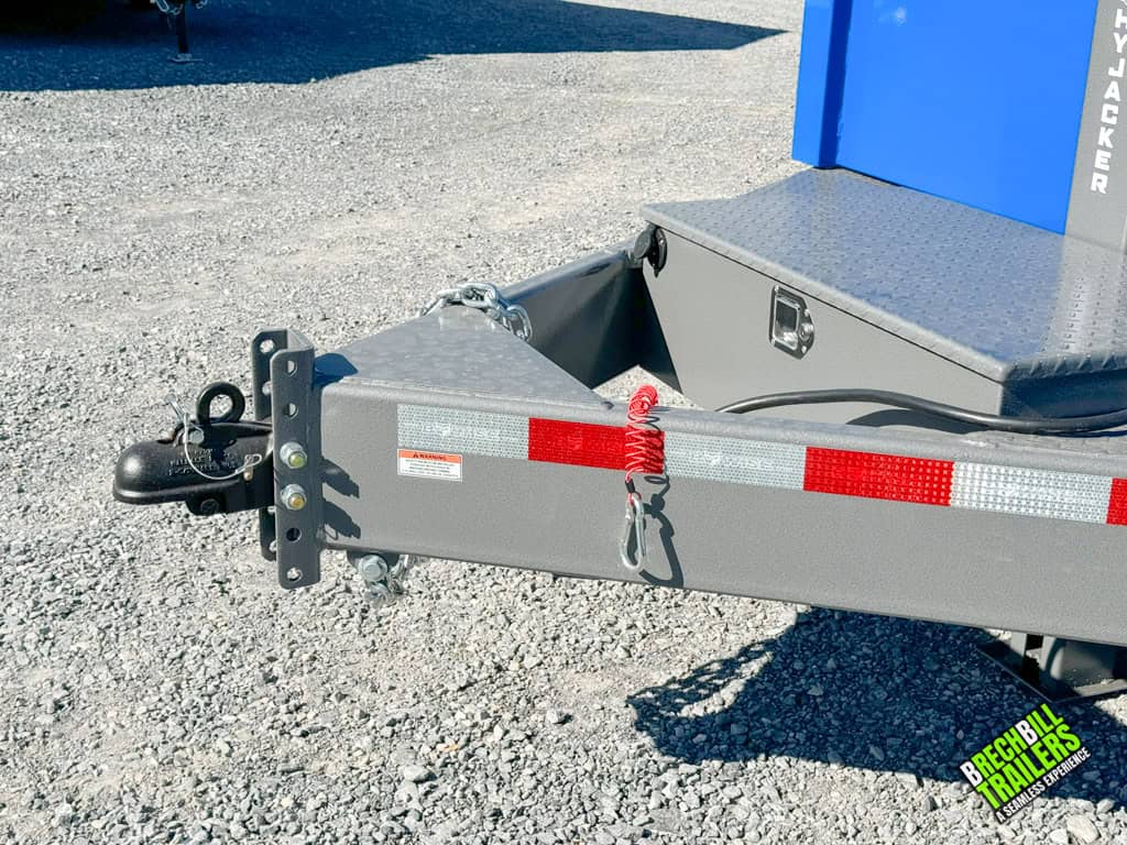 Trailer coupler and hook up with toolbox on a dump trailer