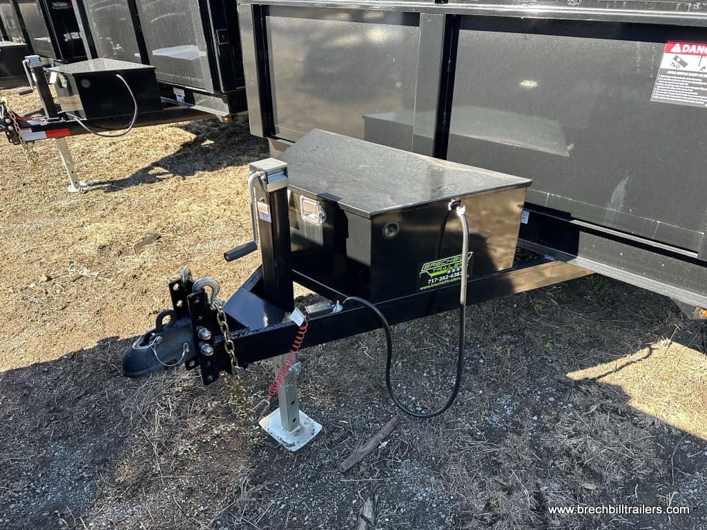 Toolbox and jack holding the parked low pro dump trailer