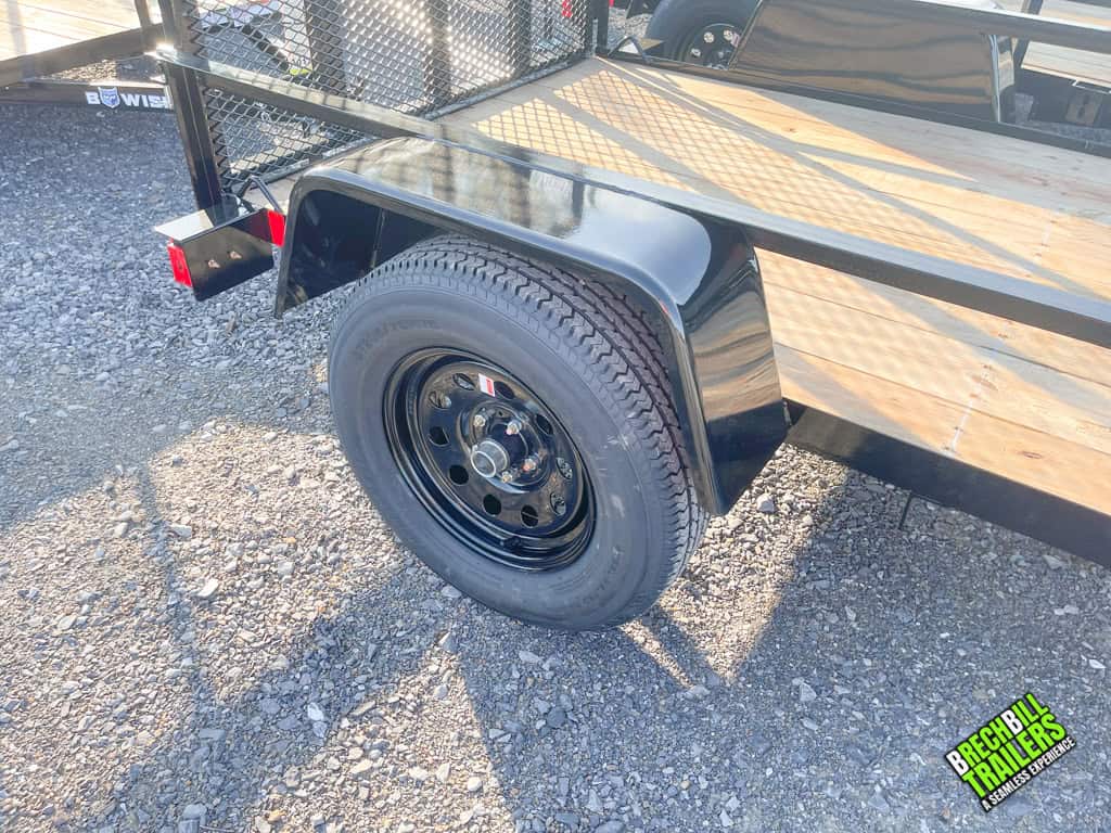 Black wheels on a Bwise UTE 3K Utility Landscape Trailer