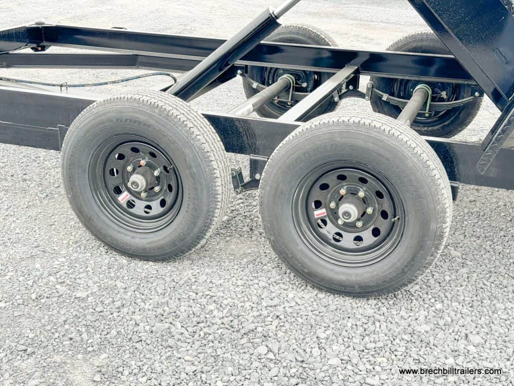The axles with black wheels.