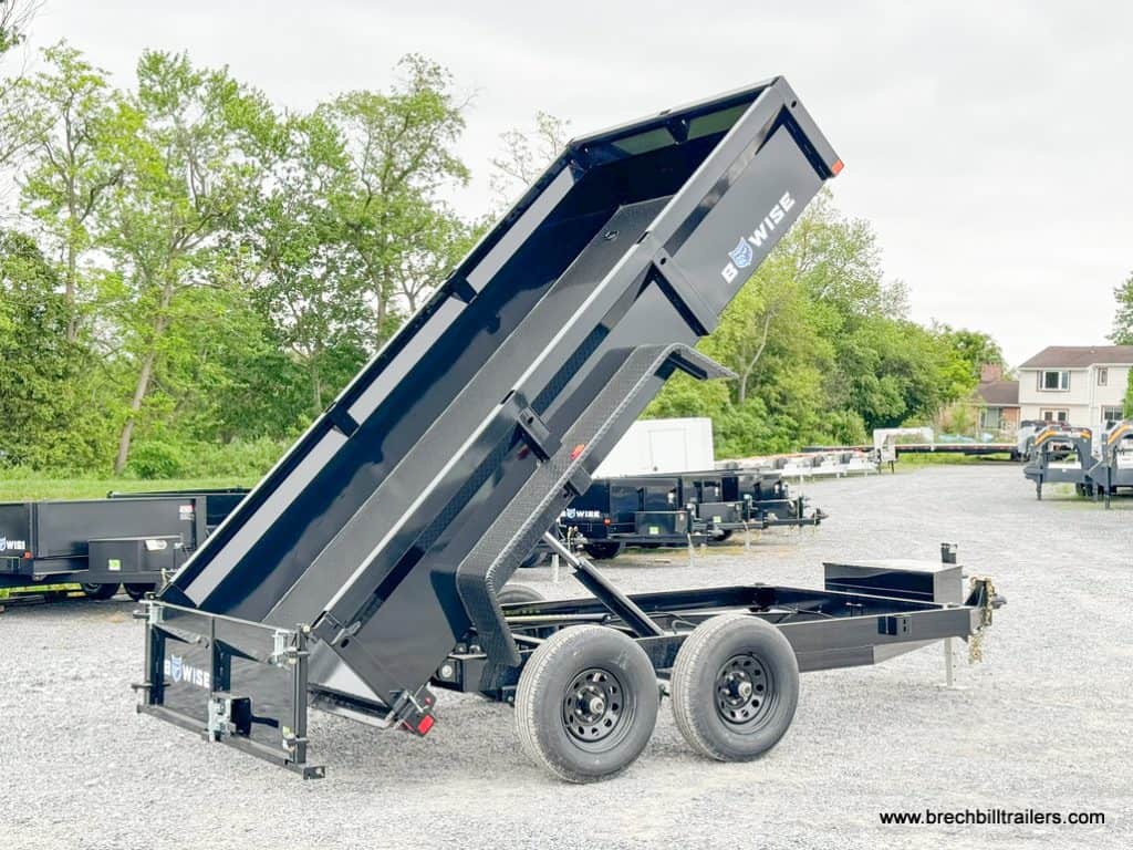 Trailer with spread gate open in the dump position.