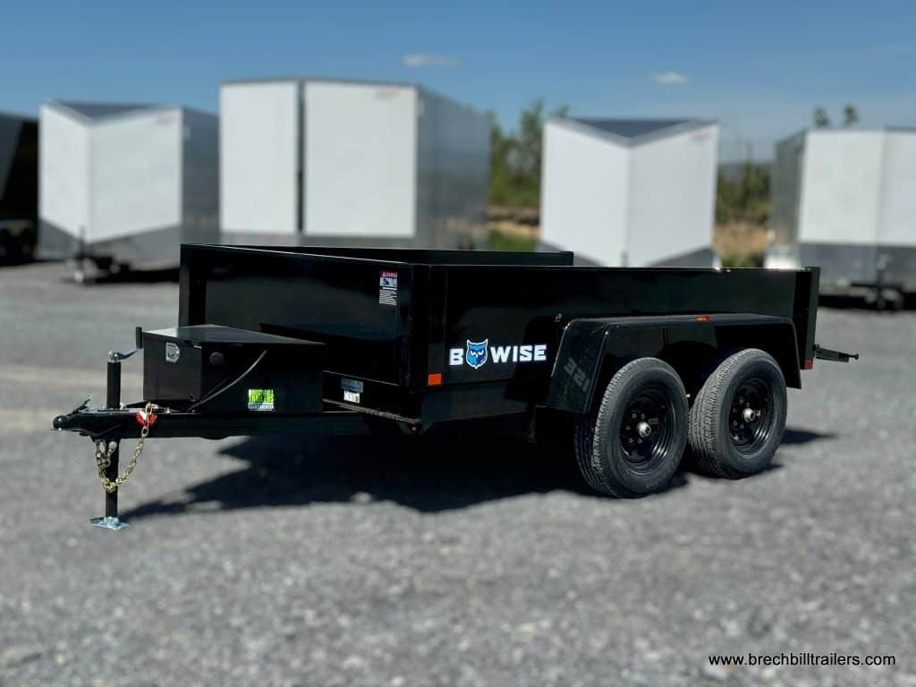 A black 6x10 Bwise Light Duty 10K Dump Trailer