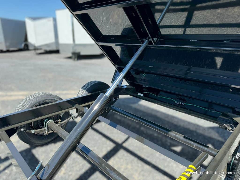 Closeup of the cylinder raising the dump trailer.