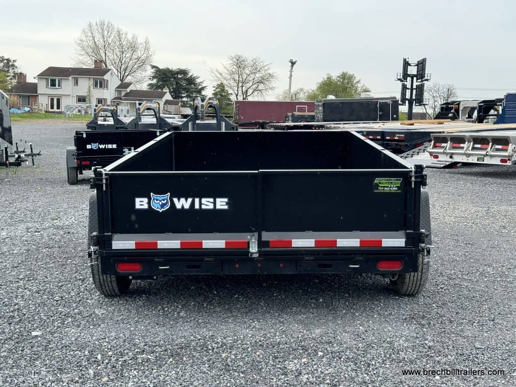 Rear view of a new Bwise LPHD 7x12 Heavy Duty Low Pro Dump Trailer