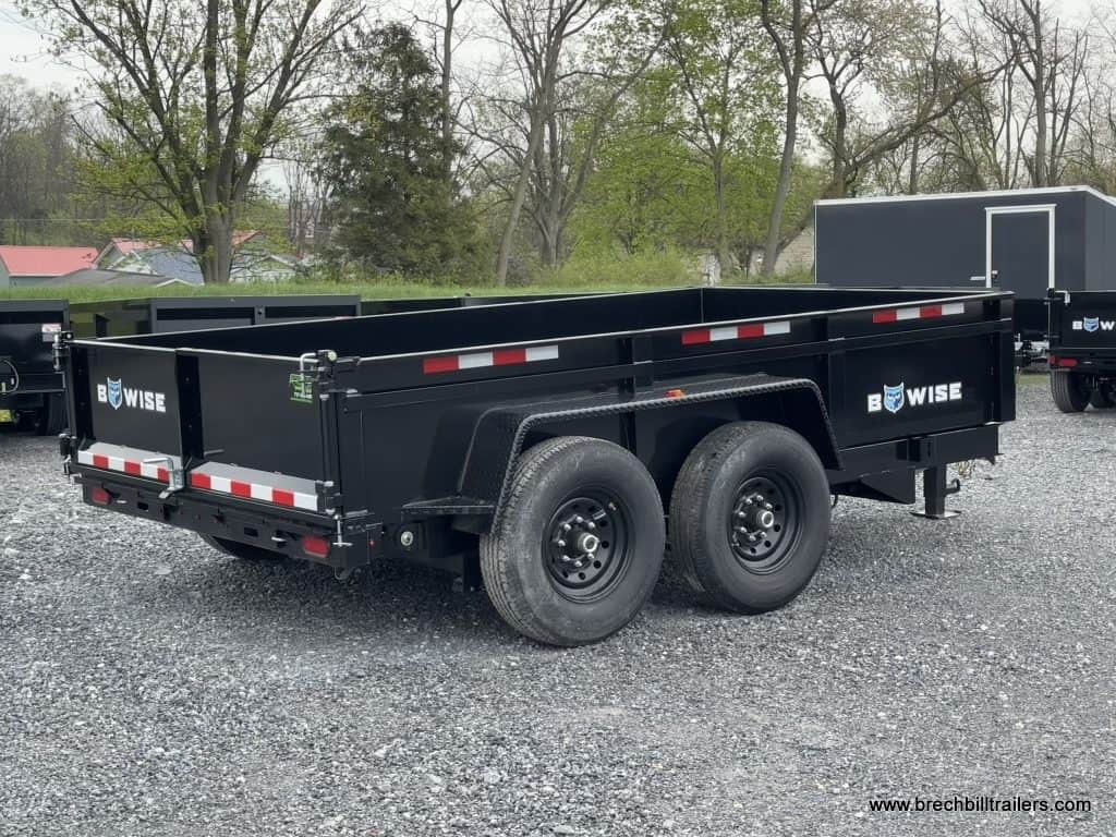 Side view of a new Bwise LPHD 7x12 Heavy Duty Low Pro Dump Trailer