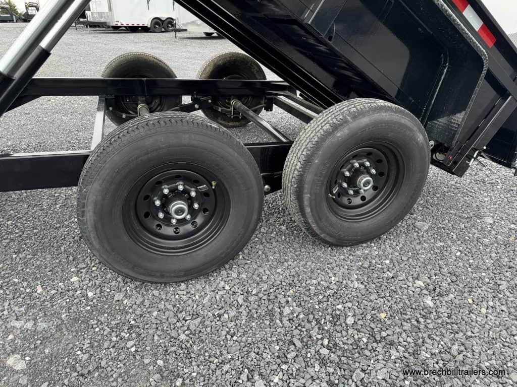 Axles and black wheels on the new Bwise dump trailer.
