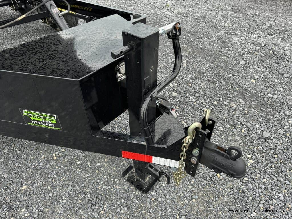 The jack on a detached Bwise LPHD 7x12 Heavy Duty Low Pro Dump Trailer