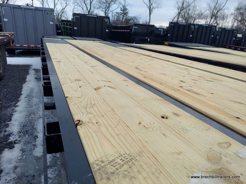 heavy duty big black deck over gooseneck equipment flat deck trailer