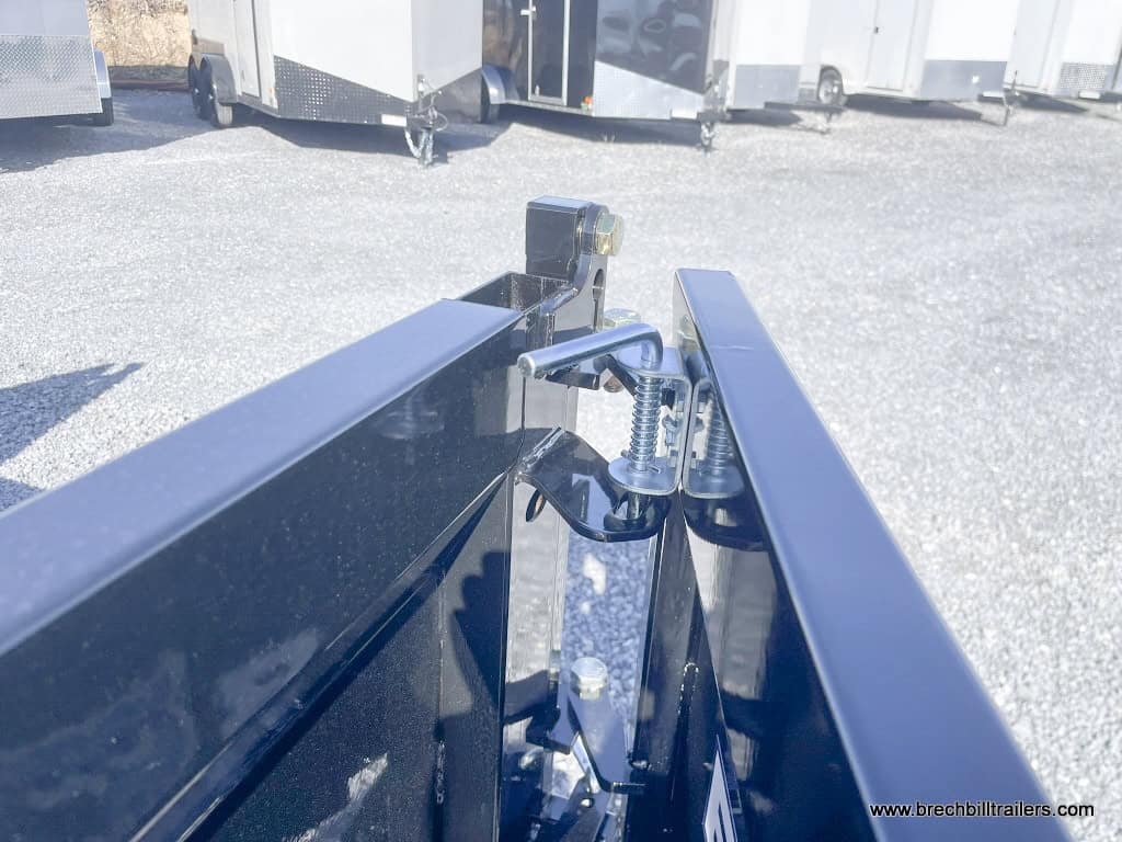 Door being locked in the open position for dumping.