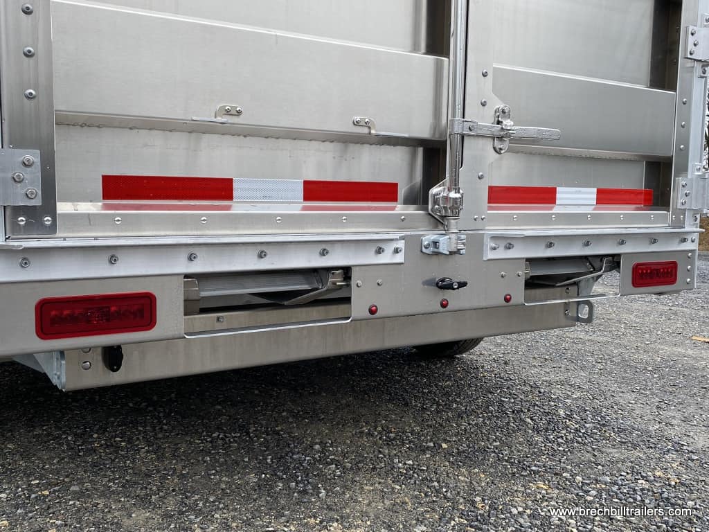 LARGE HEAVY DUTY ALL ALUMINUM DUMP TRAILER WITH HIGH SIDES AND ALUMINUM WHEELS