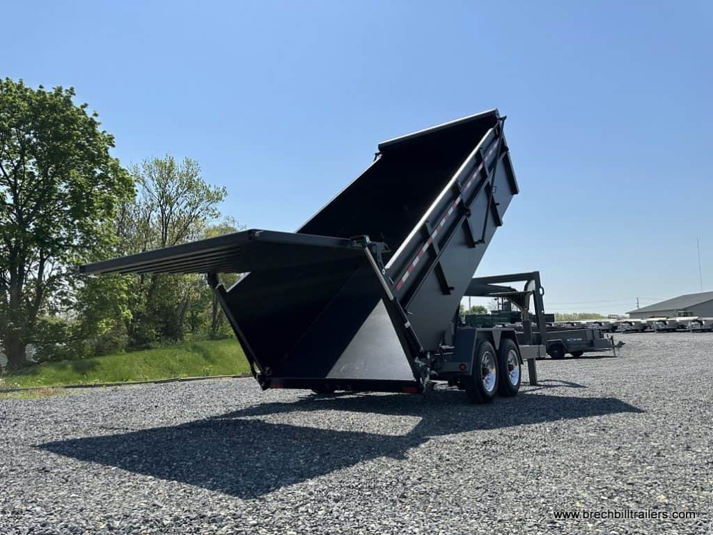 Bwise 19.2K DU Ultimate Dump Trailer on display in the lot.