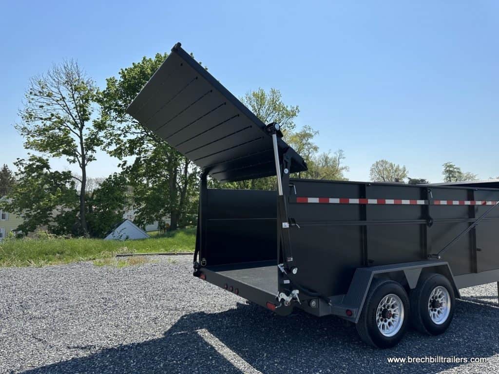 Hydraulic gate opened on the back of the trailer.
