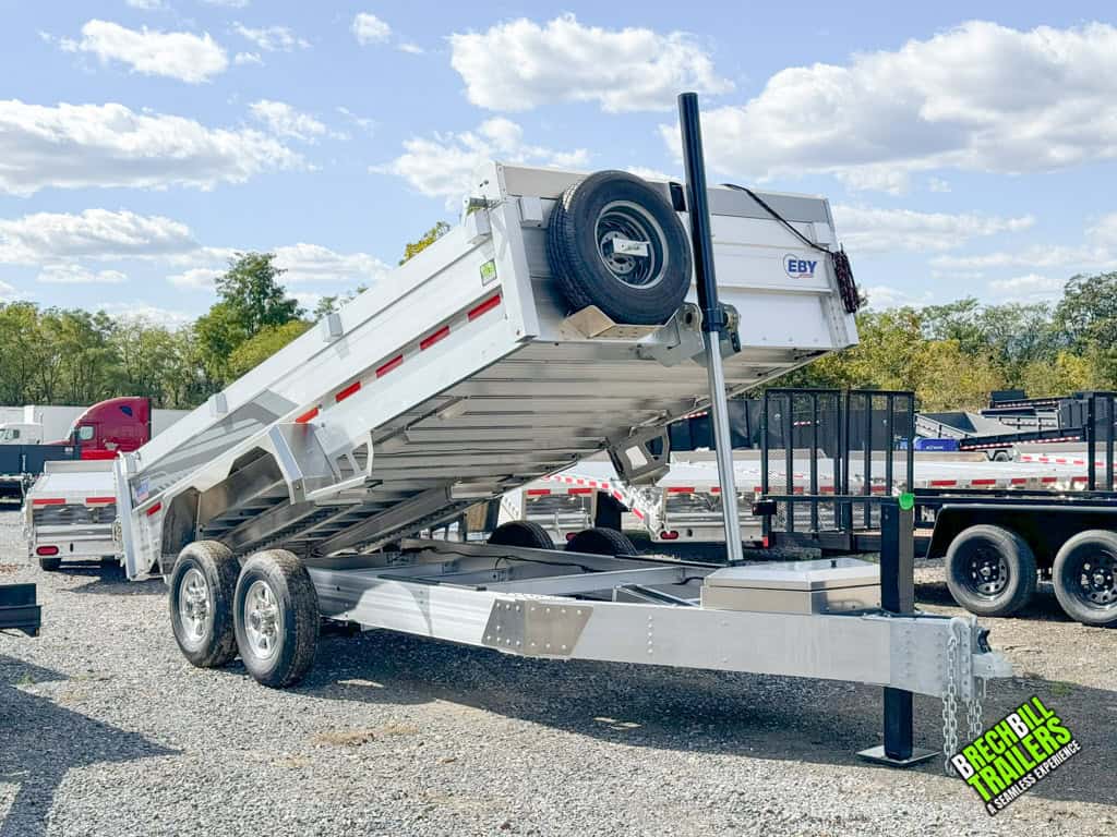 Demonstration of the EBY 14K Aluminum Bumper Pull Dump Trailer dumping.