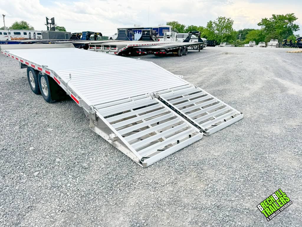 Ramps down for loading the EBY Deck-Over 14K Equipment Trailer