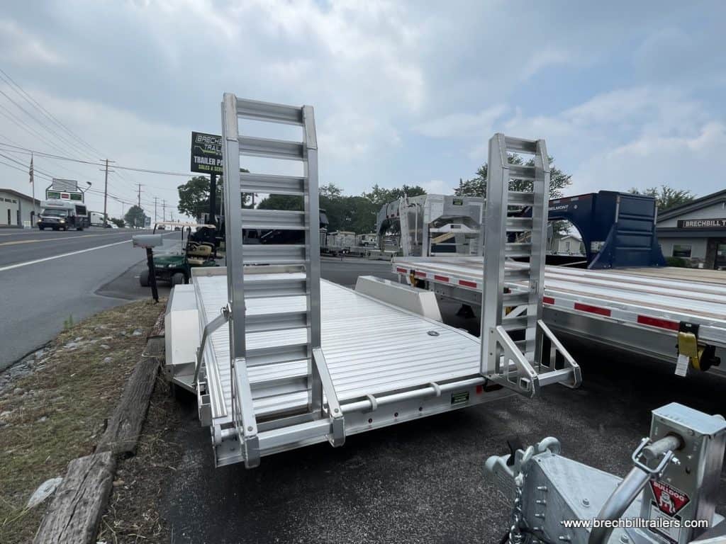 Ladder ramps on the back of the trailer.