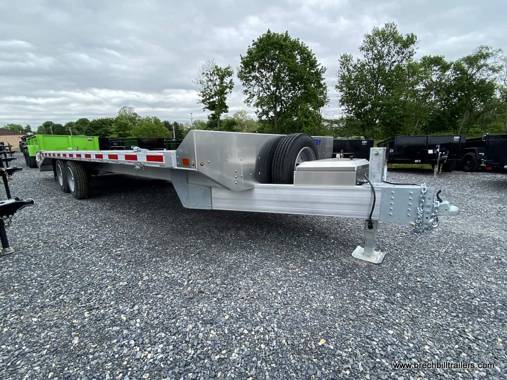 A parked EBY Deck-Over Equipment Trailer