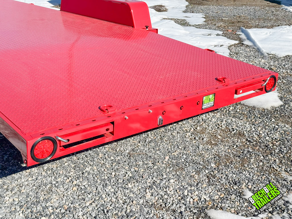 A red Bwise car hauler