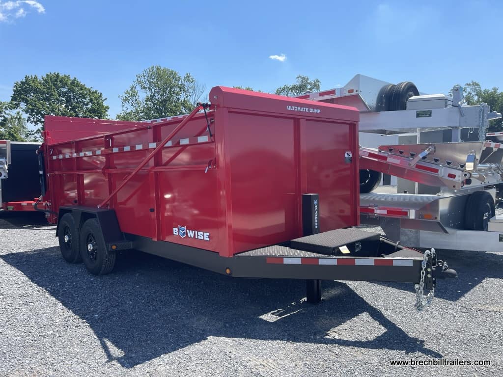Side view of a red Bwise DU Ultimate Dump Trailer 7’x16’x15.4K (DU16-15)