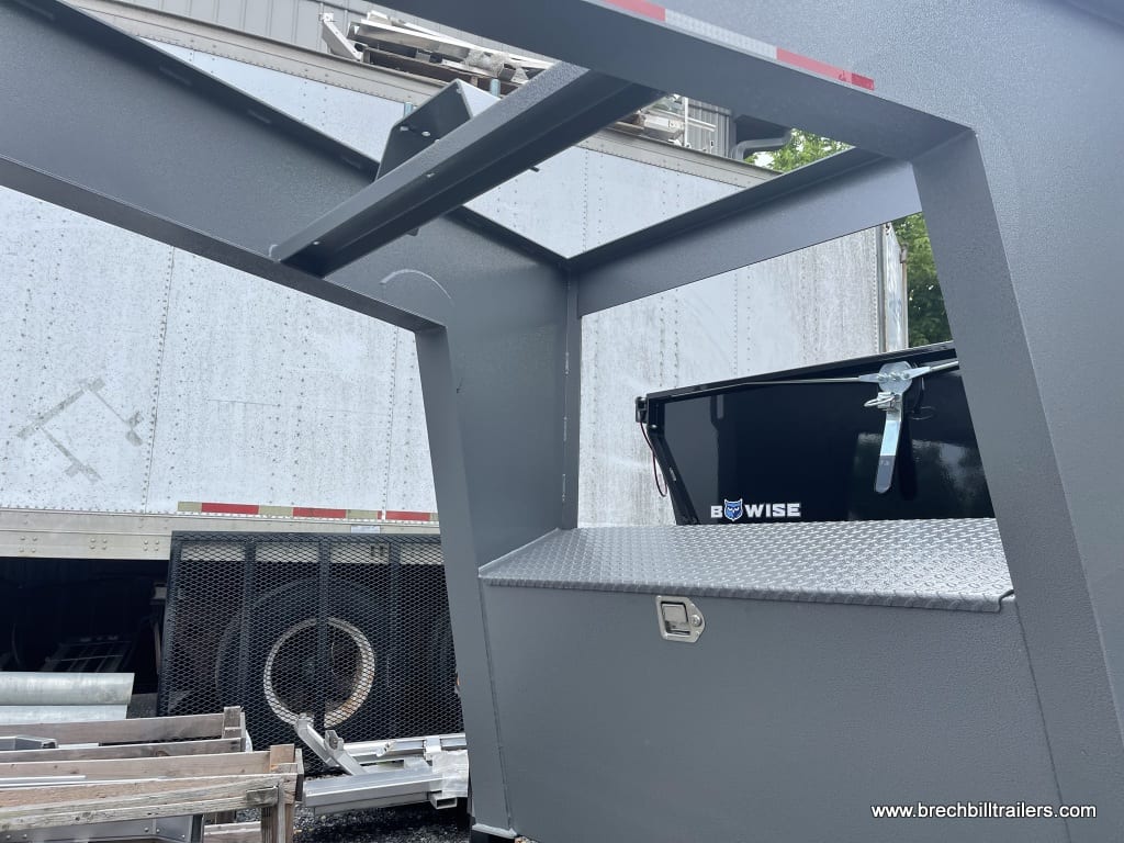 Gooseneck on the Bwise deck over equipment trailer
