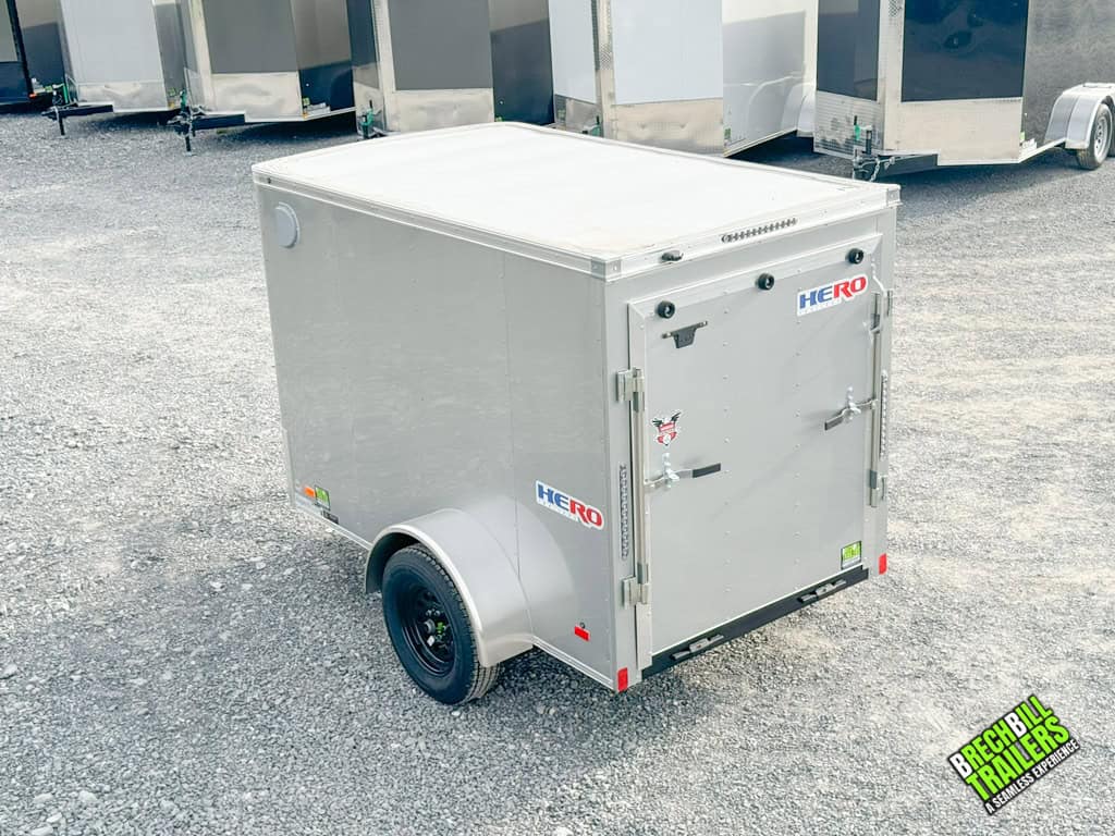The HR58SA Bravo Hero Enclosed Cargo Trailer parked on display at Brechbill Trailers.