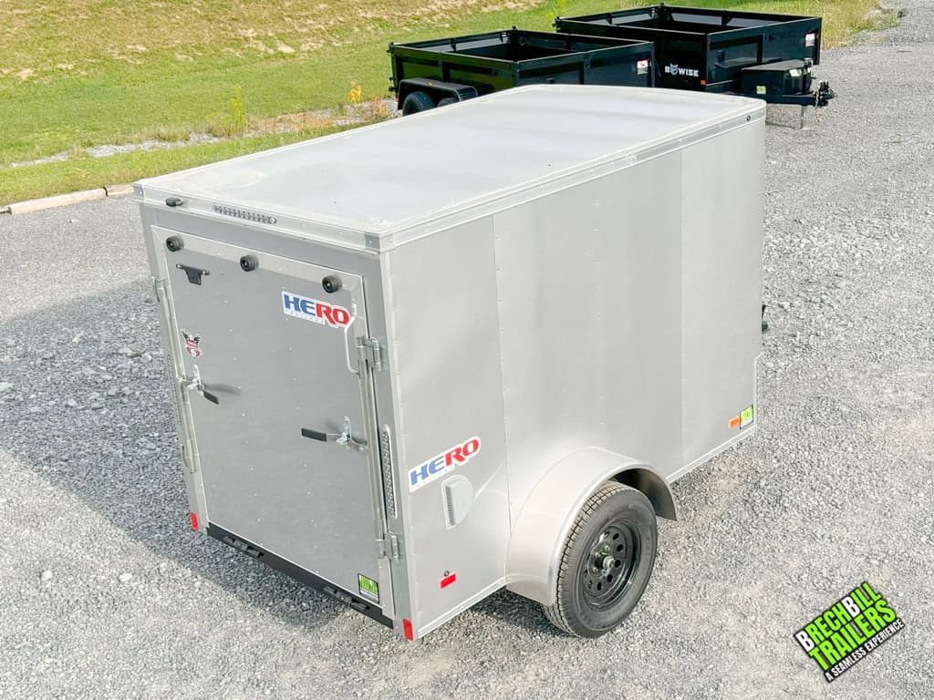 The back of a new silver Bravo Hero Enclosed Cargo Trailer.