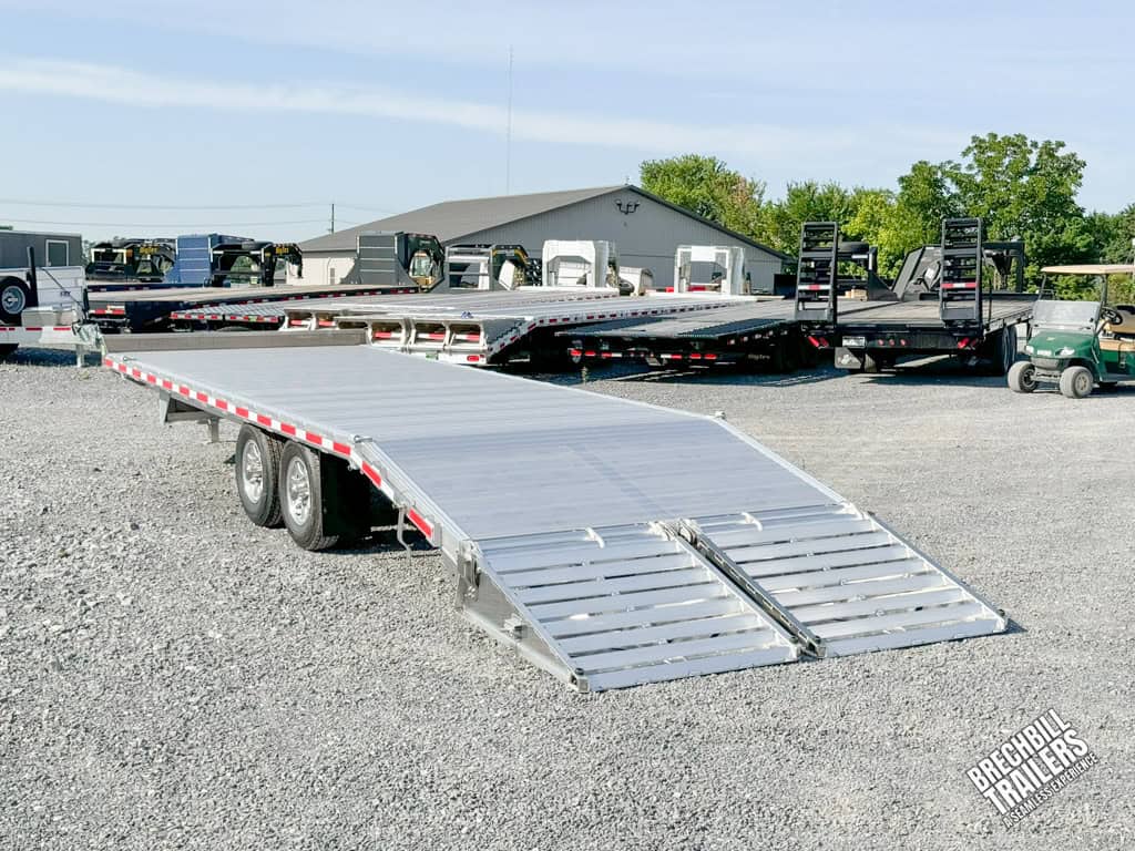 EBY Aluminum Equipment Trailer 14k Deck Over with ramps down for loading.
