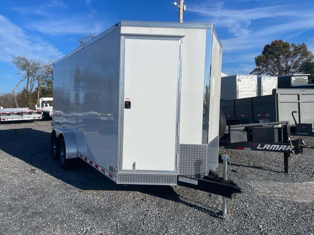 Front view of the white Bravo Star 10K Enclosed Cargo Trailer for sale.
