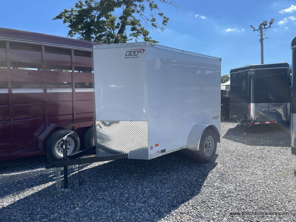 A parked Bravo Scout Enclosed Cargo Trailer 5’x8’x3K (SC58SA)
