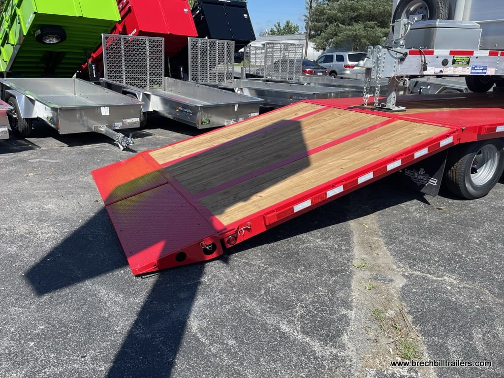 Red gooseneck equipment trailer ramps