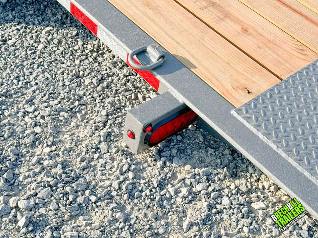 Tilt trailer all the way down in the loading position.