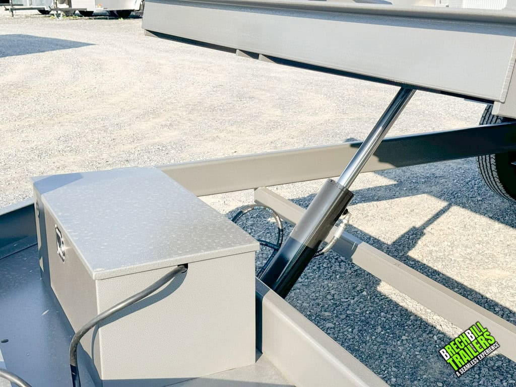 The cylinder extended to tilt the Bwise trailer