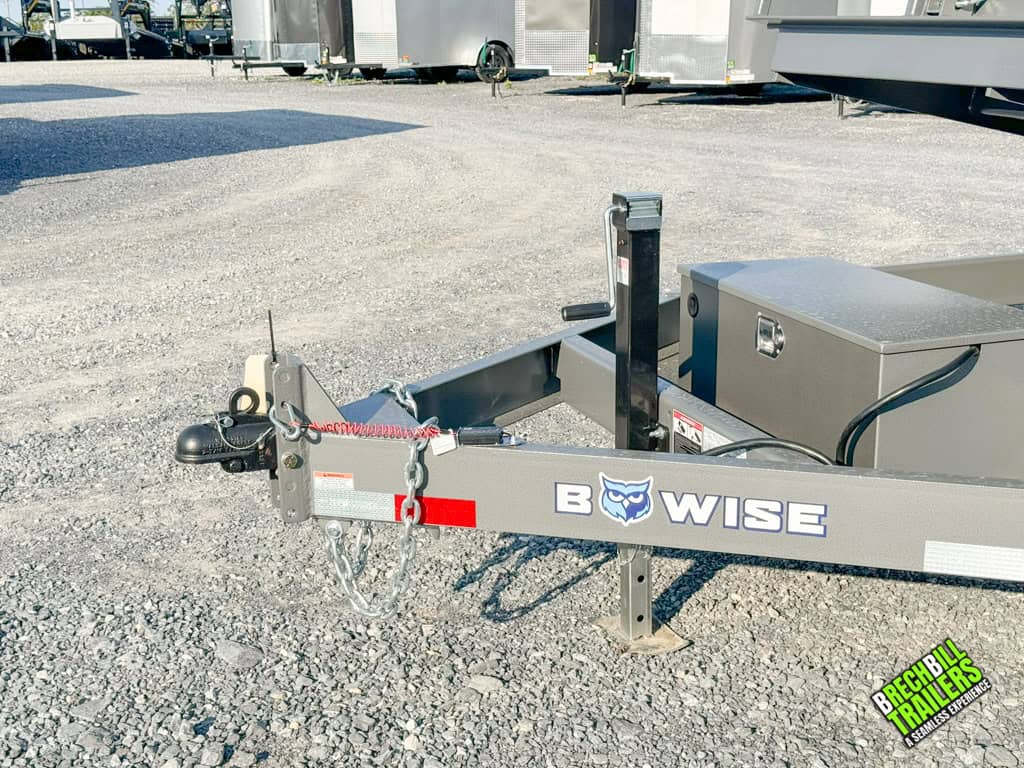 The couple and jack on the Bwise hydraulic tilt trailer.