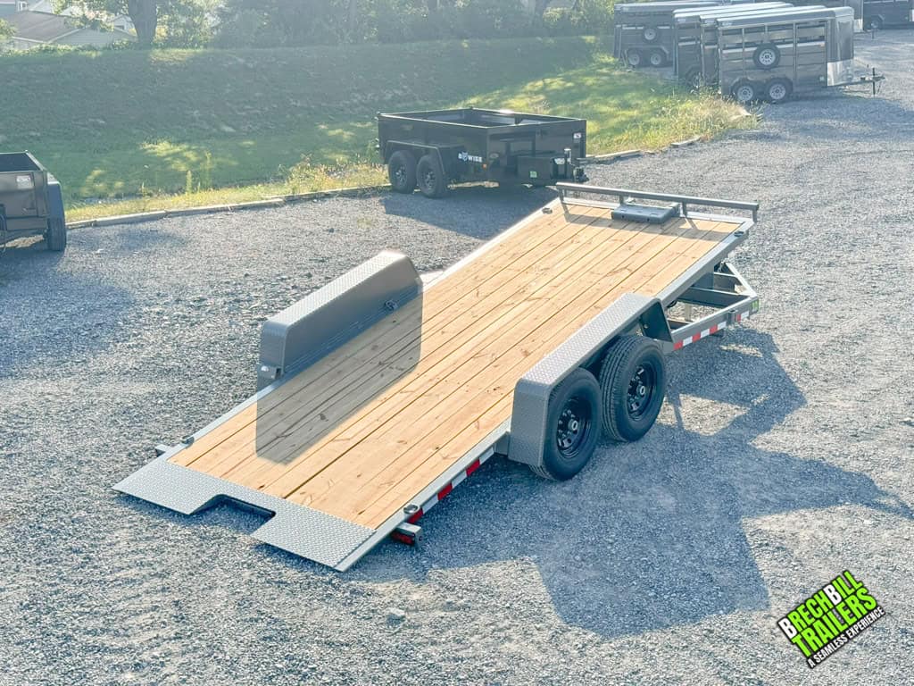 The 7x18 Bwise Hydraulic Tilt Trailer fully tilted.