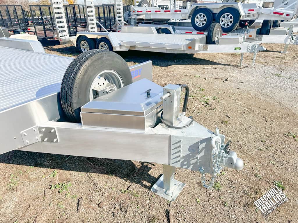 Trailer coupler, spare wheel and jacj.