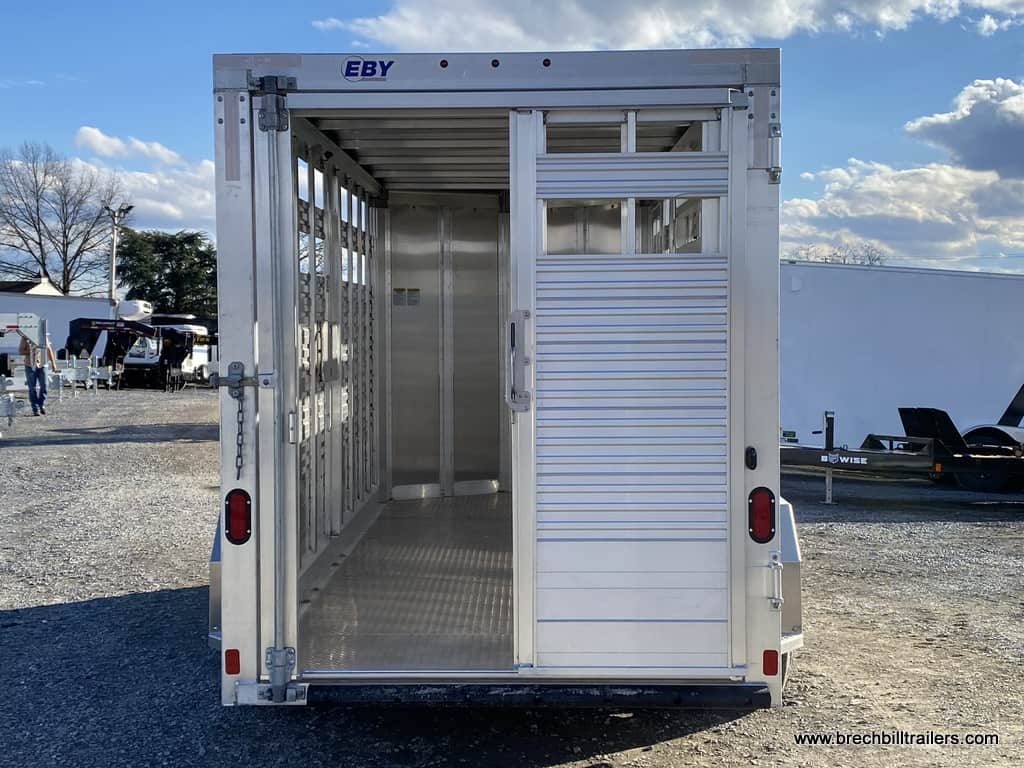 Back door open to preview the inside of the aluminum trailer