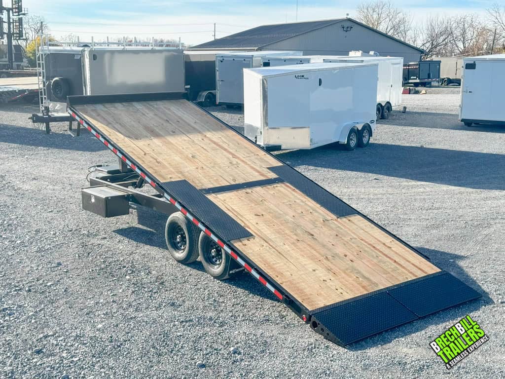 22ft long Bwise hydraulic tilt-deck trailer in action.