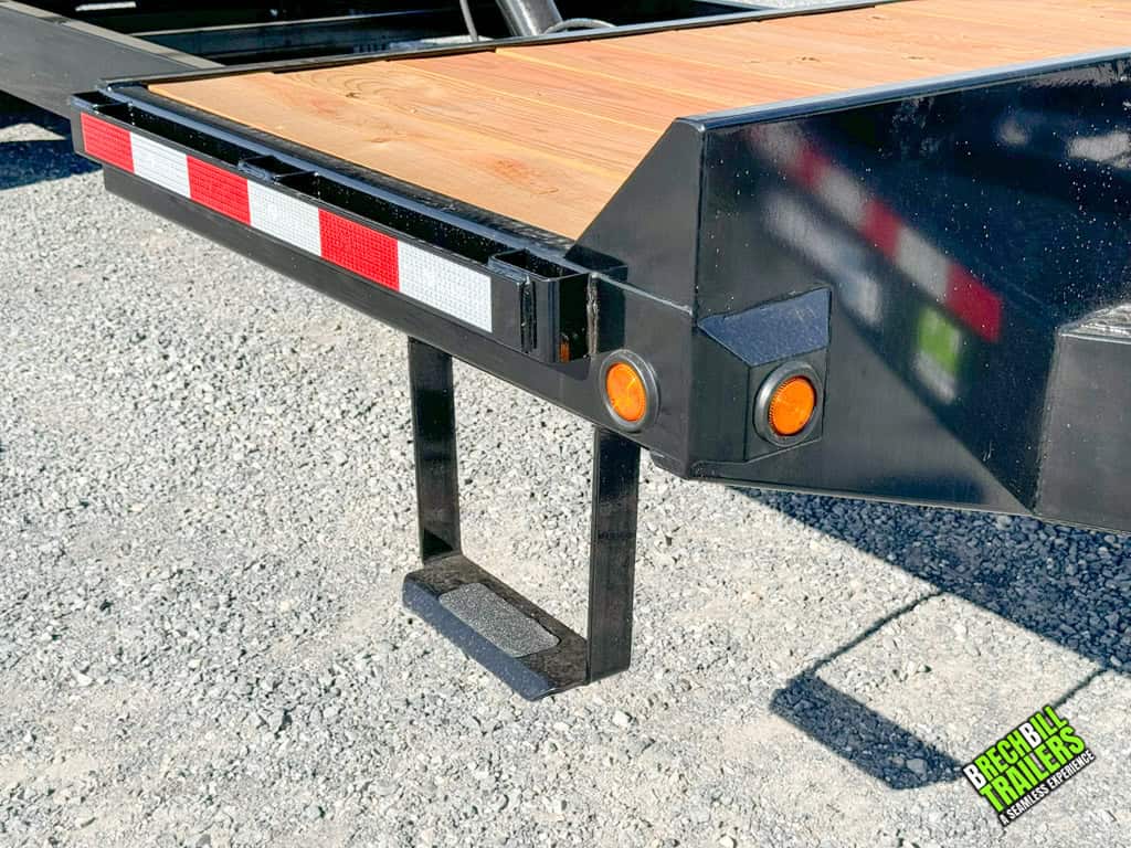 Close up view of the Bwise 17.6K Hydraulic Tilt Deck Trailer for sale.