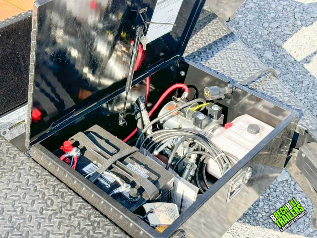 The battery box on the Bwise 17.6K Hydraulic Tilt Deck Trailer