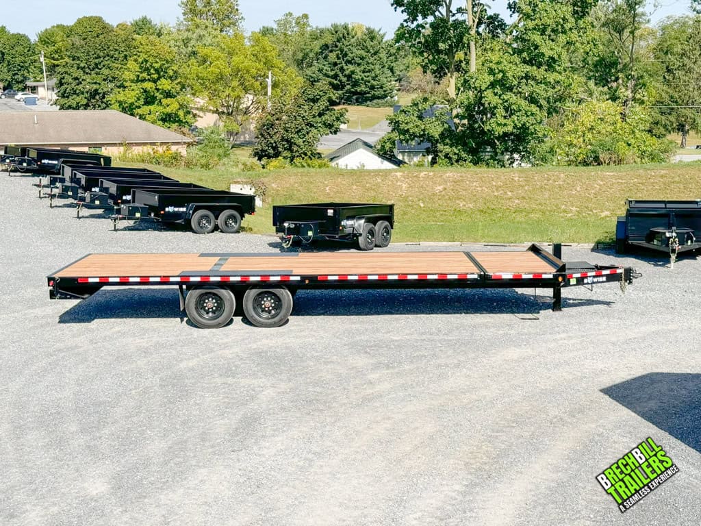Side view of a Bwise 17.6K Hydraulic Tilt Deck Trailer for sale.