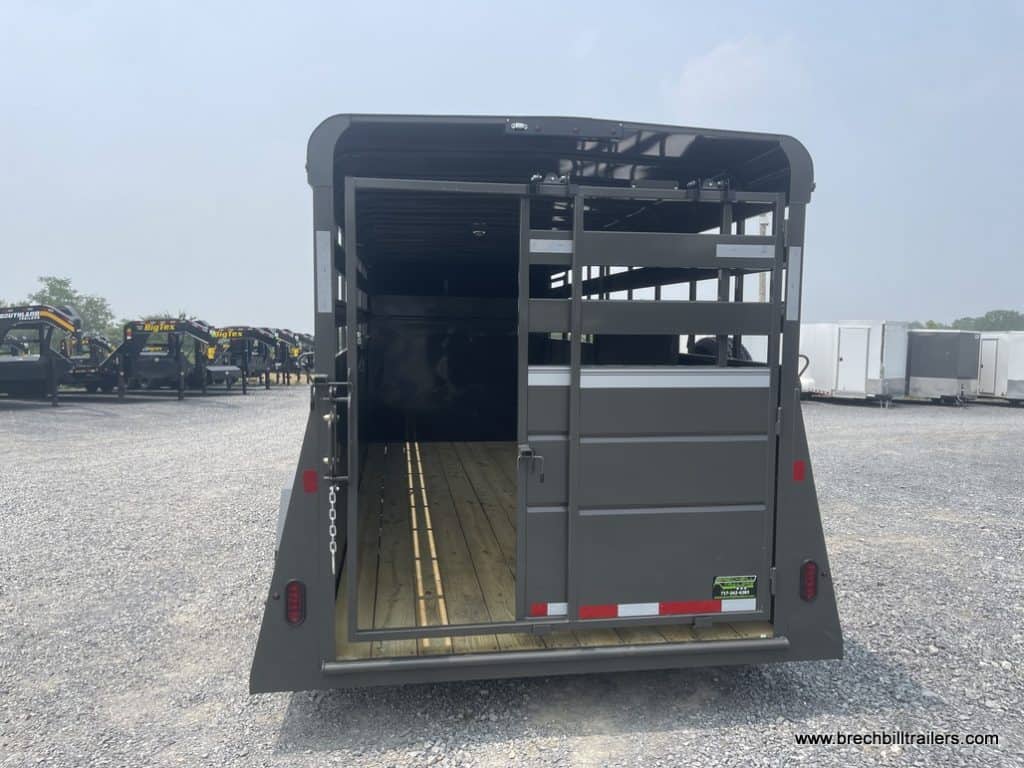 Slide door on the back of the Valley 12K Gooseneck Stock Trailer