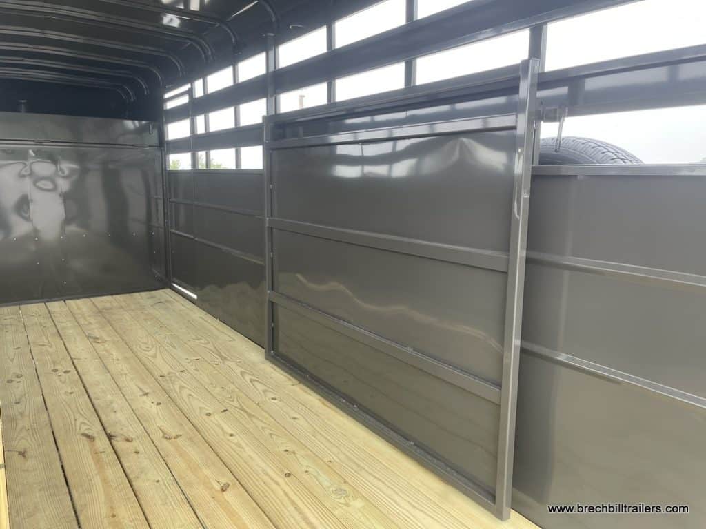 Inside looking at the gates in the Valley 12K Gooseneck Stock Trailer