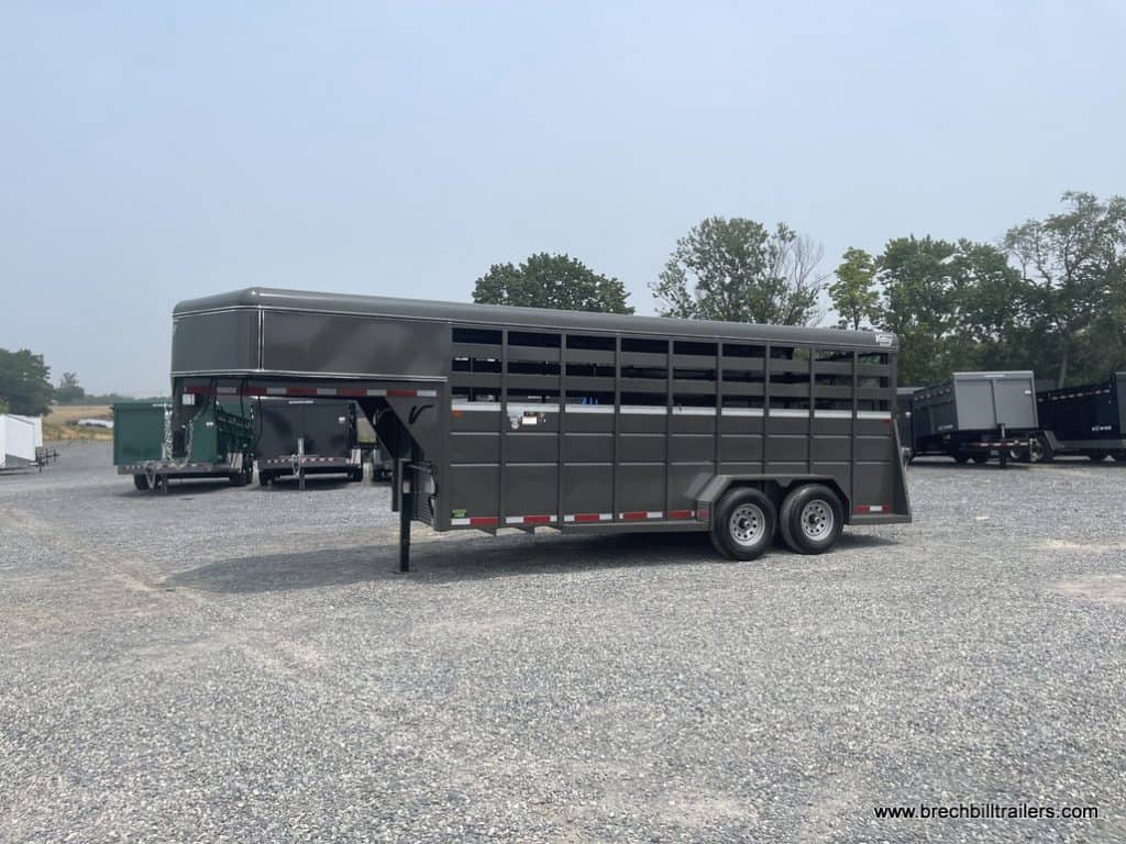 A brand new charcoal Valley 12K Gooseneck Stock Trailer