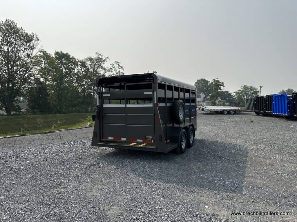 Back view of Valley 12K Stock Trailer 6’8″x16’ (26816HD) parked