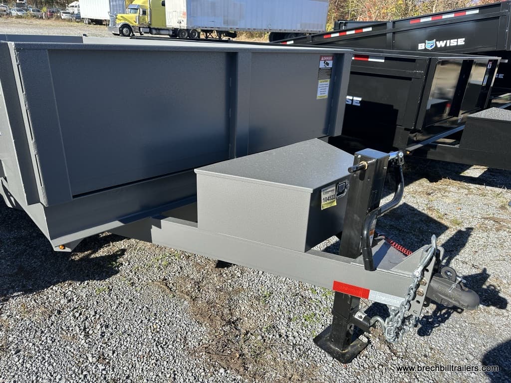 Black jack holding the parked gray Bwise LPHD Low Pro Dump Trailer