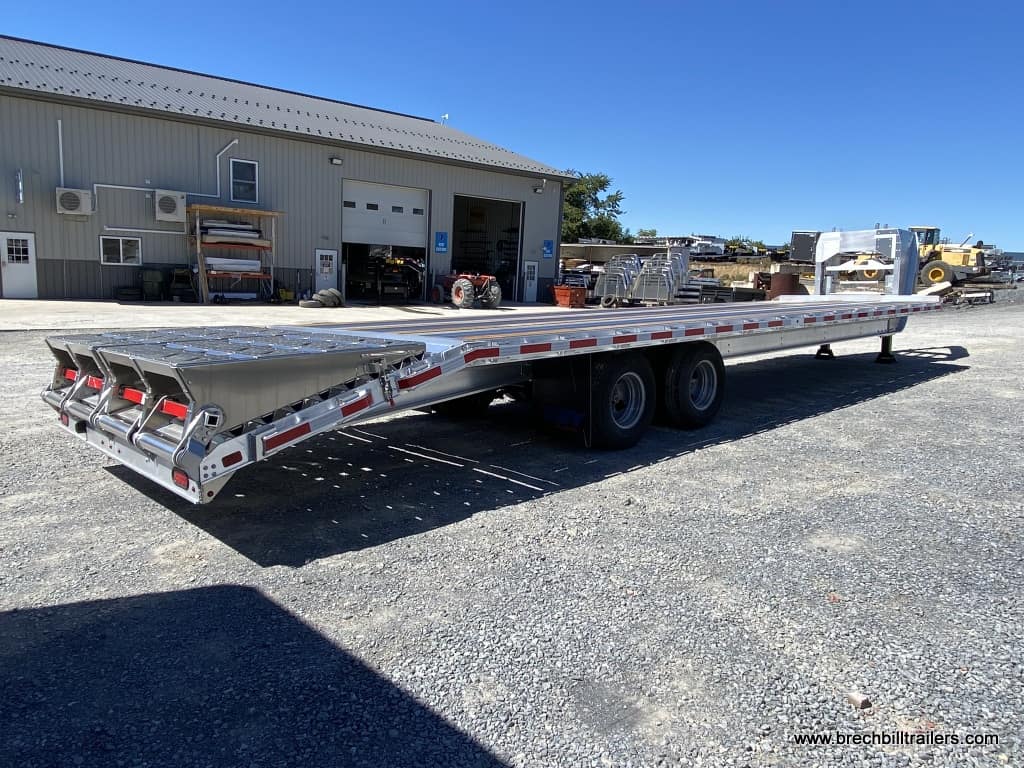 View of the EBY Deck-Over Gooseneck Equipment Trailer from the side