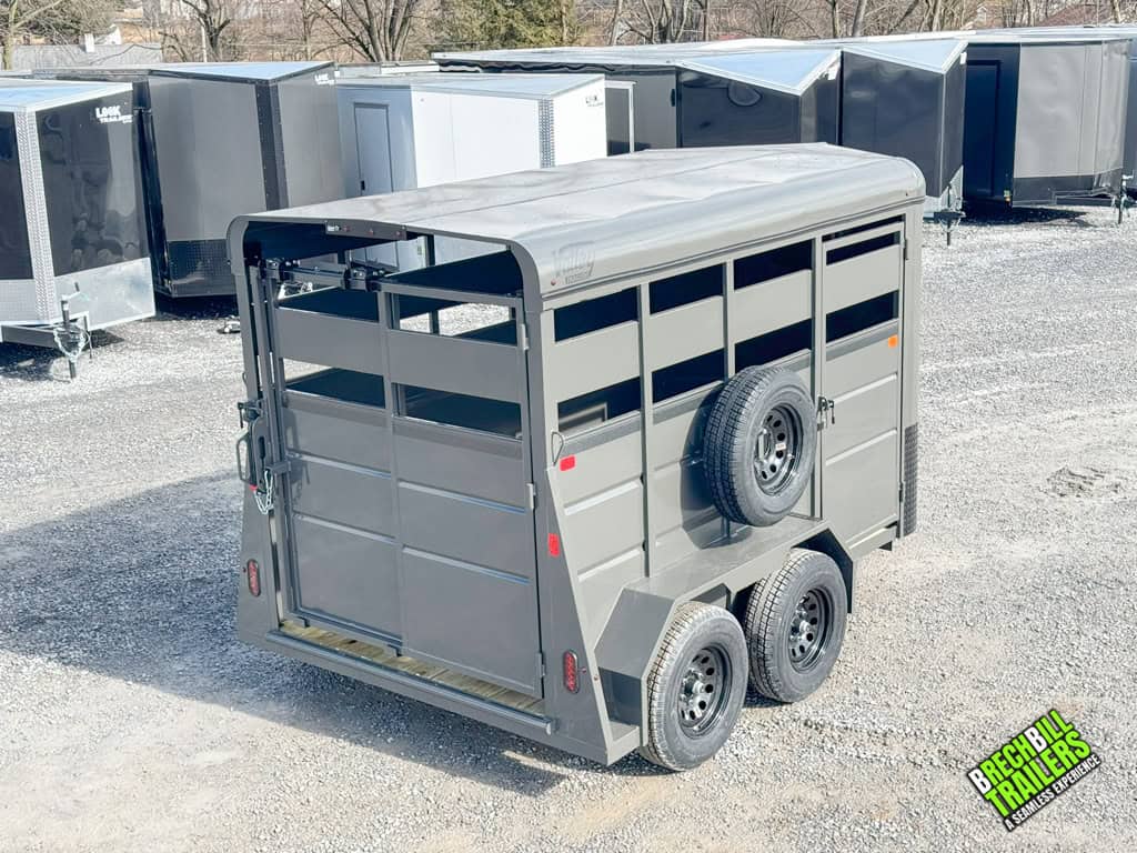 Side view with spare tire mounted on the Valley 7K Stock Trailer