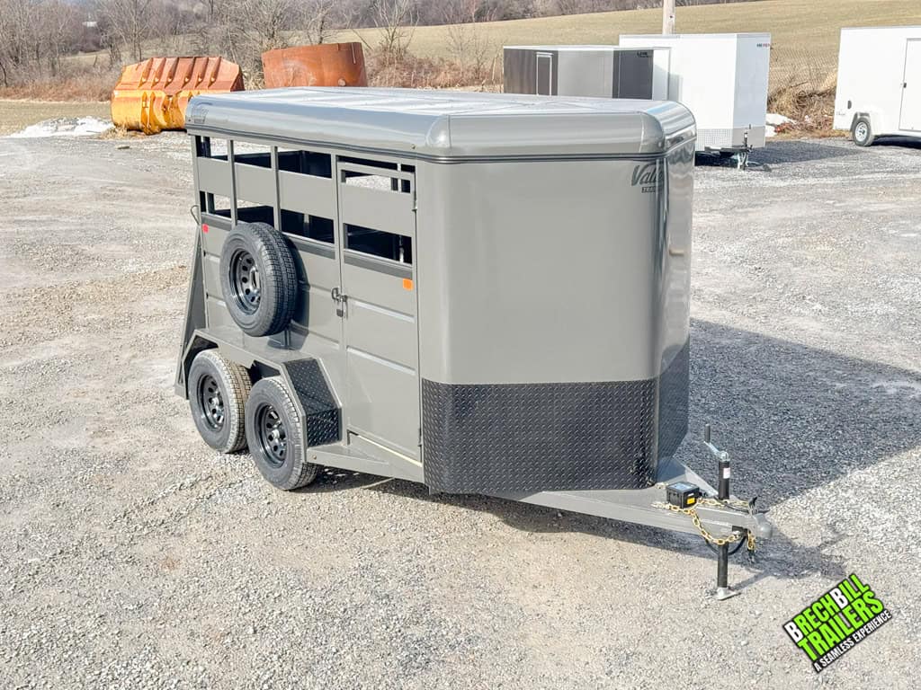 A brand new 6x12 stock trailer parked