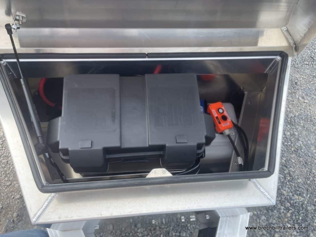 Battery box and hydraulic control on the EBY All Aluminum Bumper Pull Dump Trailer